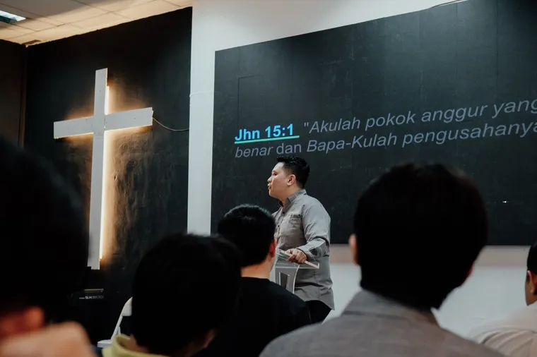 The pastor preaching during a Sunday sermon