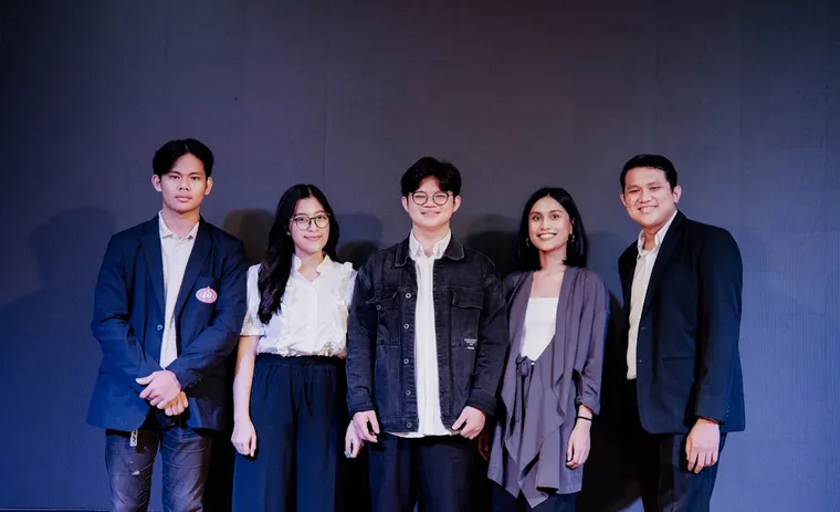 The praise and worship team standing together