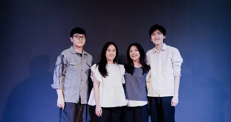 The production team standing together